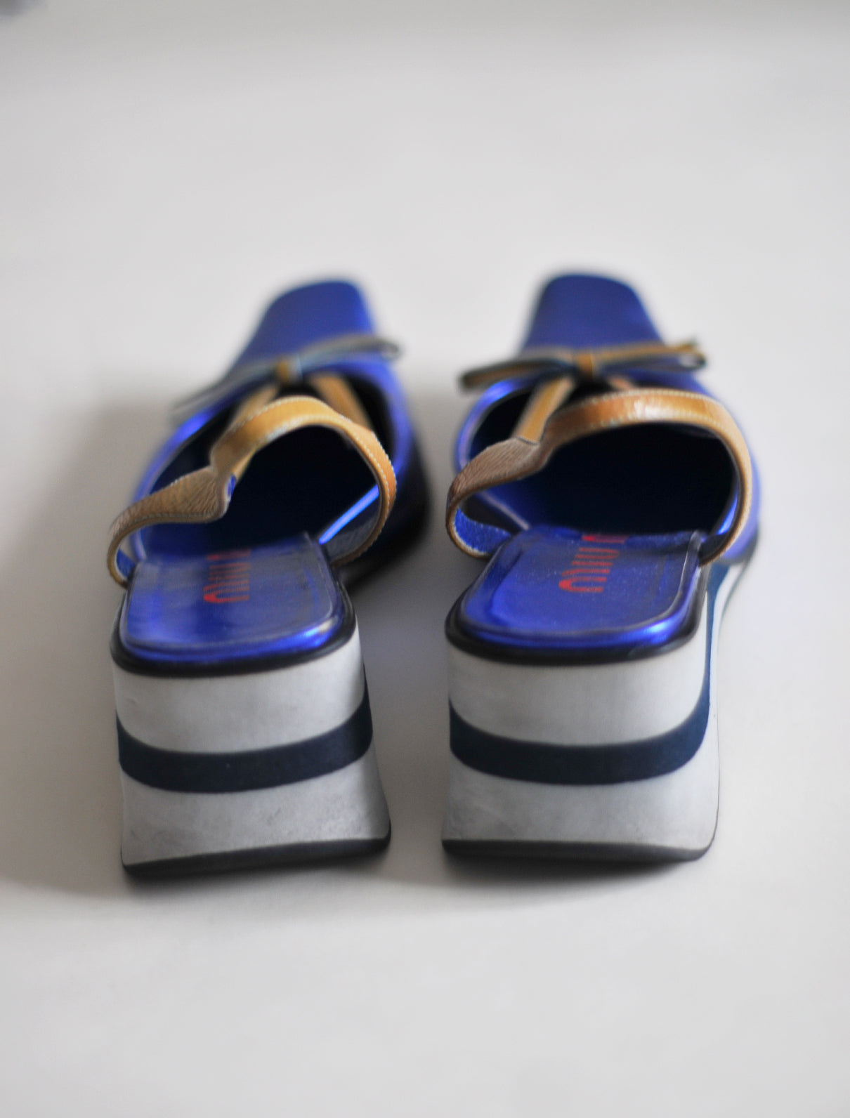 Miu Miu metallic blue platforms