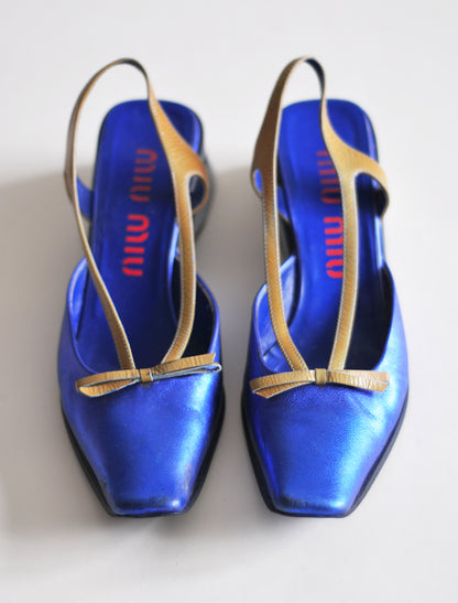 Miu Miu metallic blue platforms