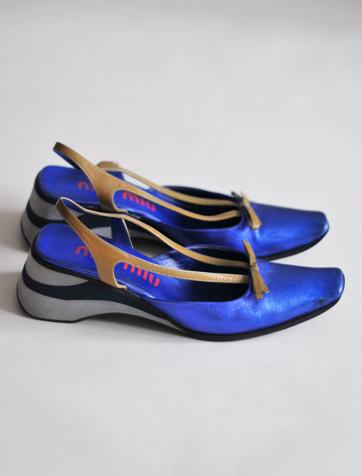 Miu Miu metallic blue platforms
