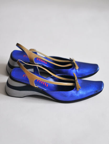 Miu Miu metallic blue platforms