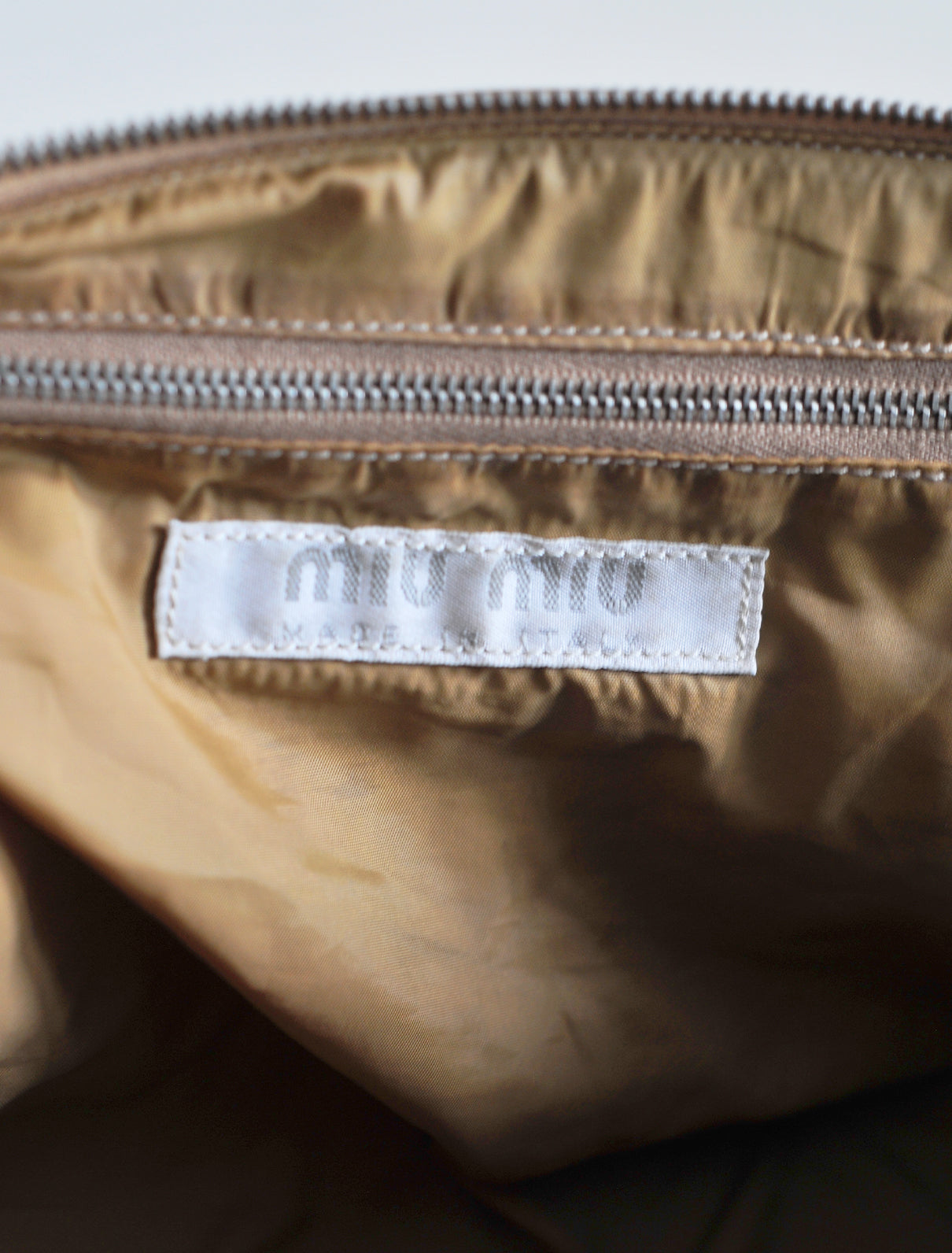 Miu Miu beige bag