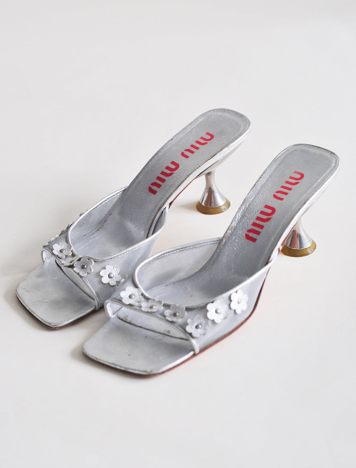 Miu Miu silver daisy heels