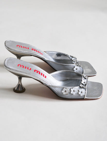 Miu Miu silver daisy heels