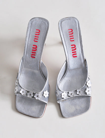 Miu Miu silver daisy heels